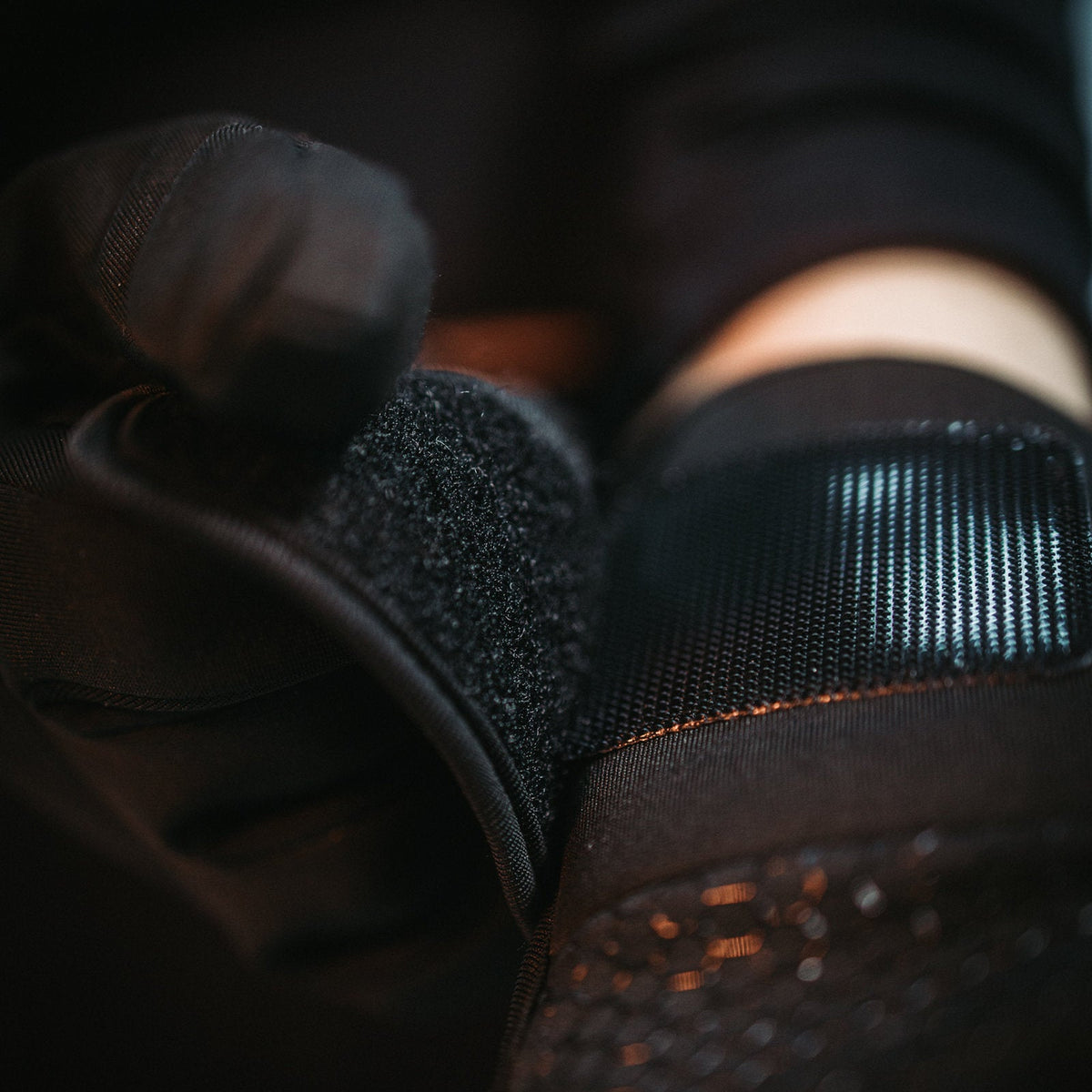 Fastening the adjustable wrist closure of a Heat Up Active heated glove