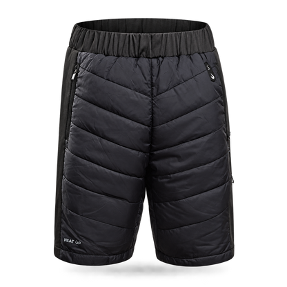 Bermuda chauffant Heat Up, noir matelassé avec taille élastique et poches zippées, vue de face sur fond gris foncé