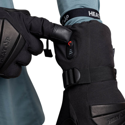 Pressing the heat level button on a Heat Up Peak heated glove