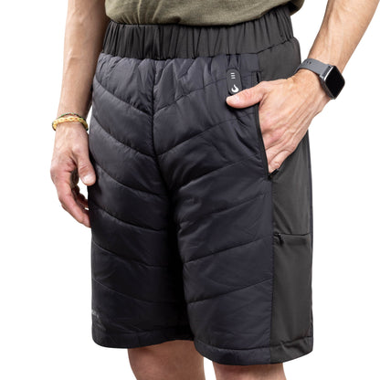 heatup heated shorts mountain series front view pocket worn by a person hand in pocket